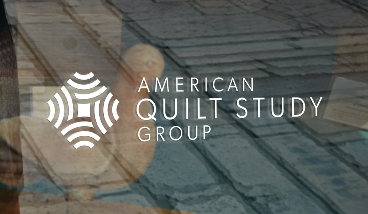 AQSG brand logo on window