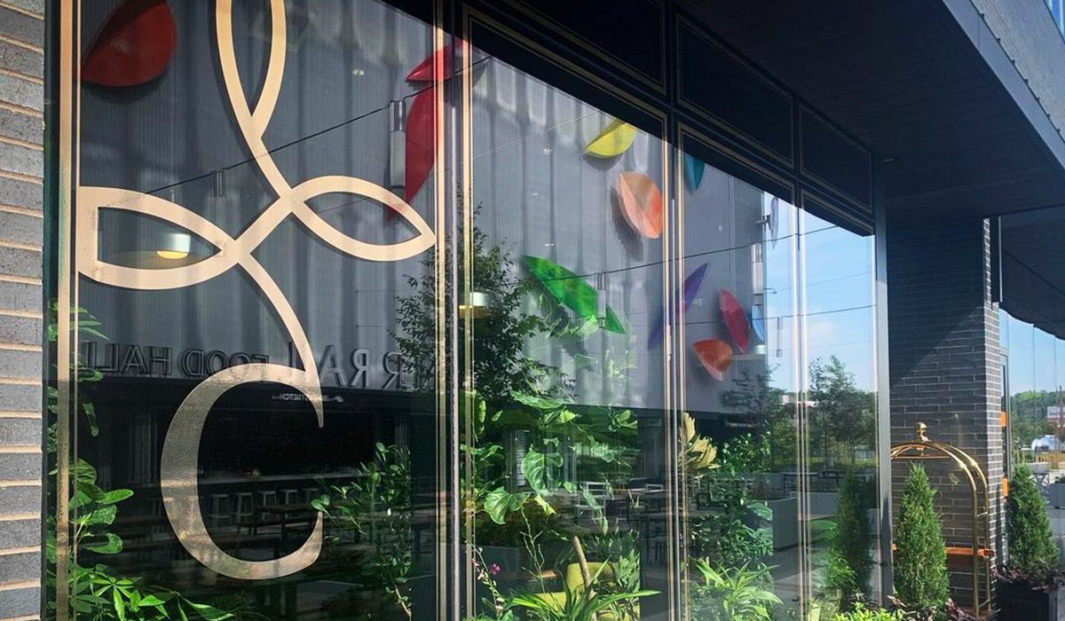 branded window signage for plant store