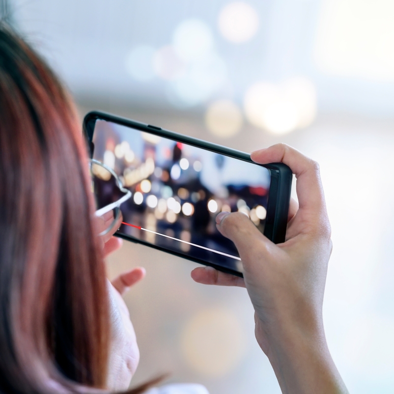 woman watching video in email