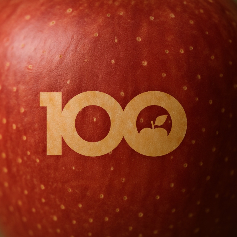 100th anniversary logo etched in an apple