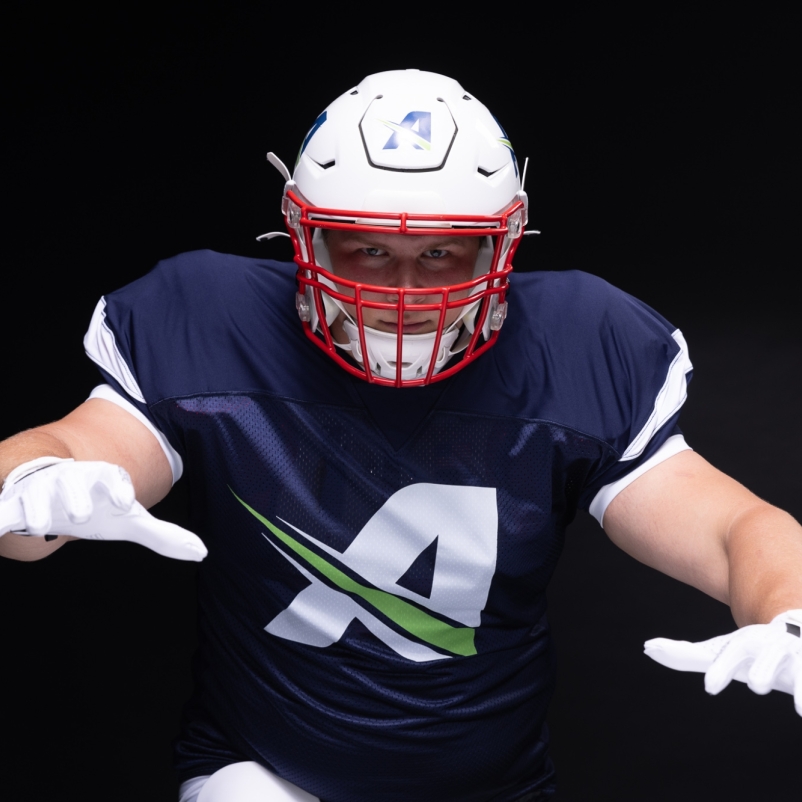 Nebraska Cornhuskers Ty Robinson posing for NIL photoshoot