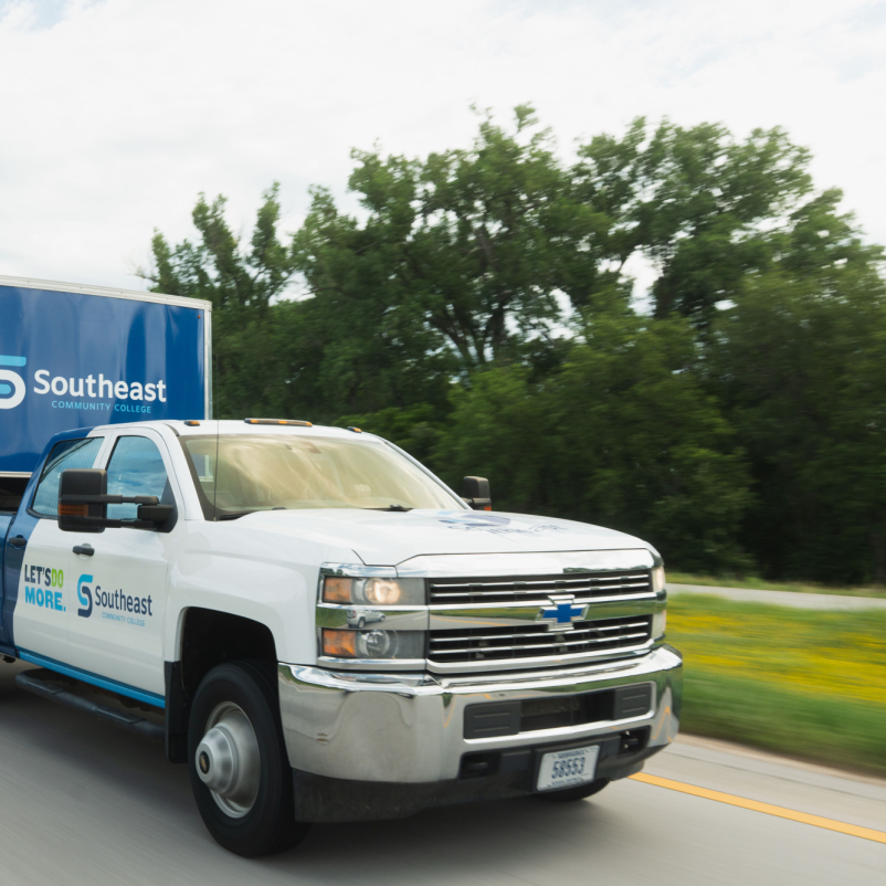 SCC wrapped truck driving on the highway