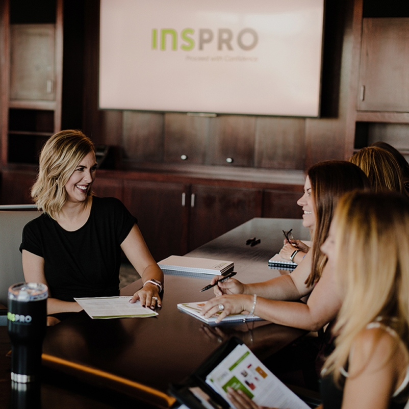 women talking at work