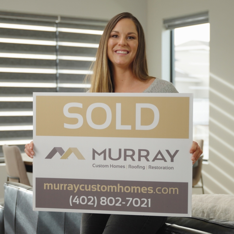 Woman holding a sign 