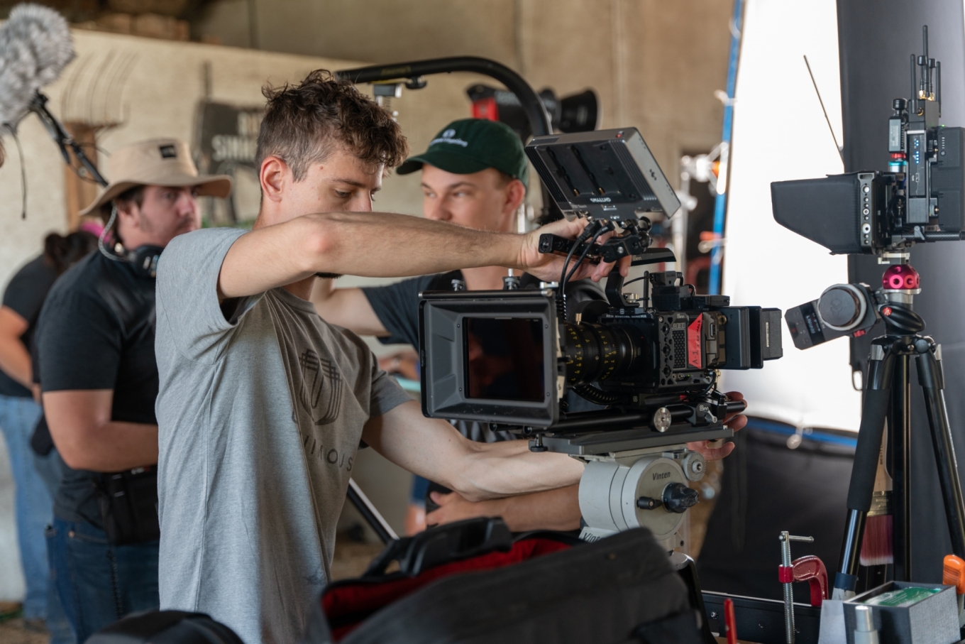 video team holding camera