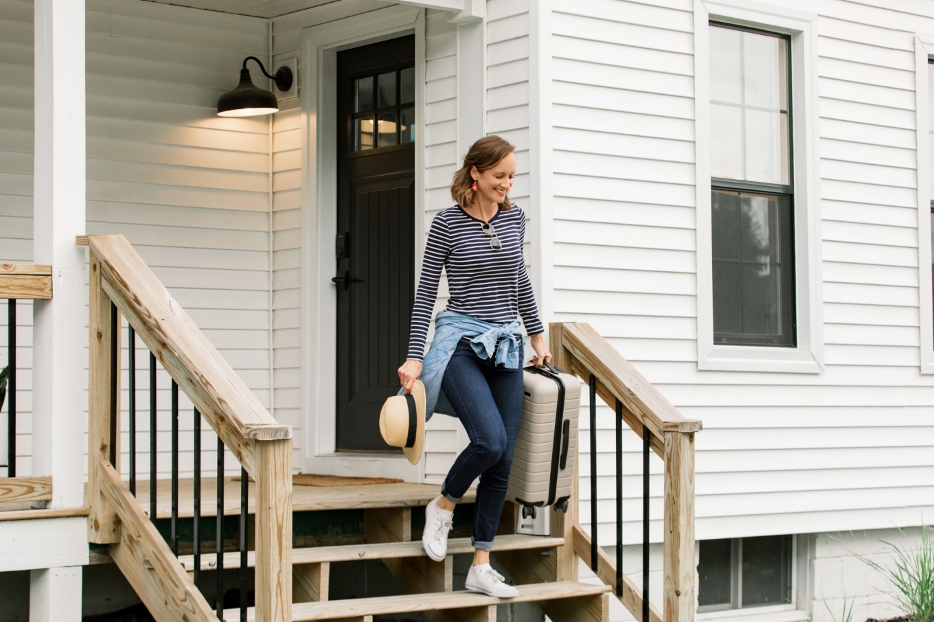 Woman walking down the porch steps