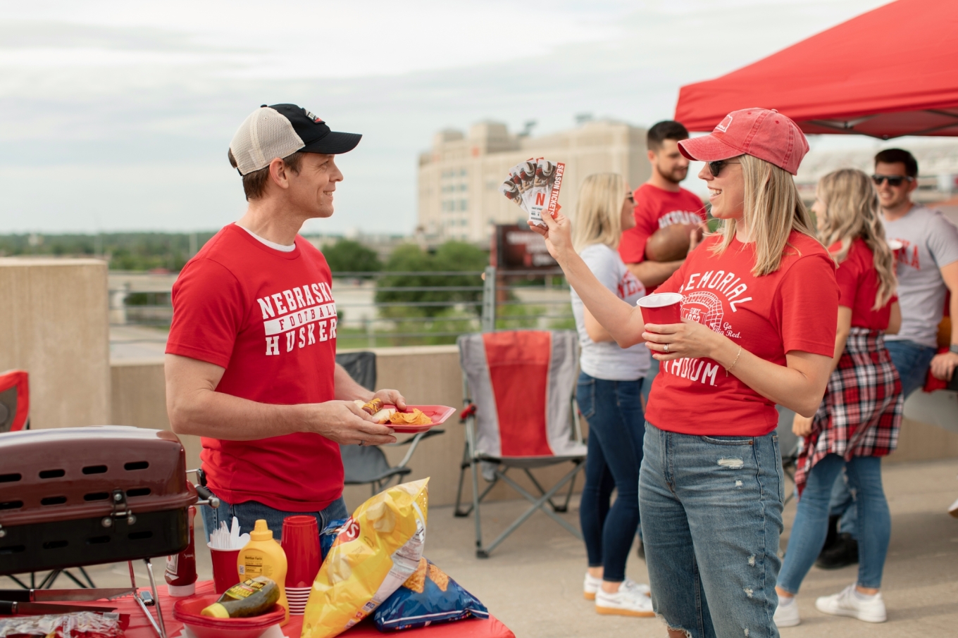 Woman holding up tickets