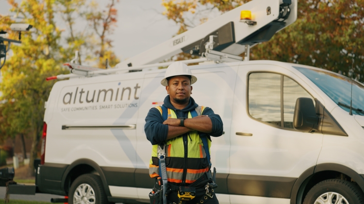 Man in front of utility truck