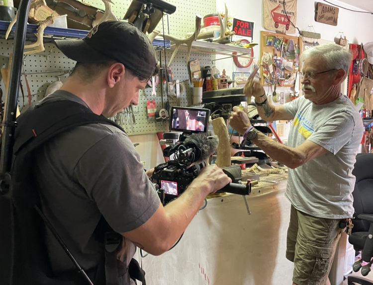 Video Producer filming Gary working in his woodshop