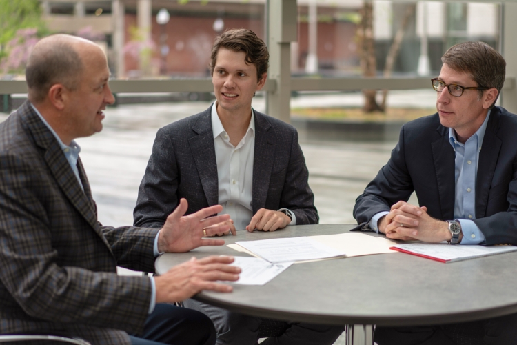 guys discussing documents