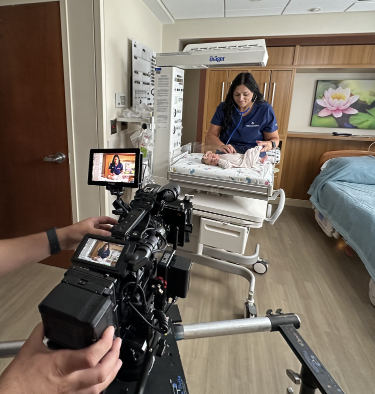 York General Video Production - Nurse weighing newborn baby