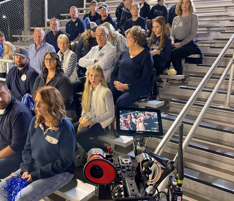 Crew setting up football fan scene