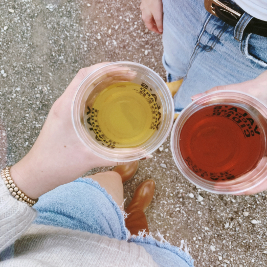 Graphic Designer, Emily Bray, with cider