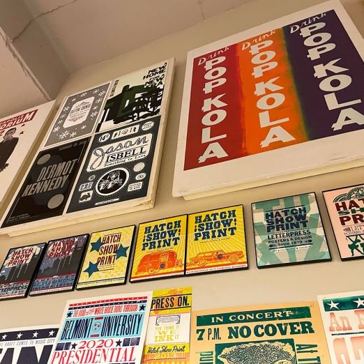 photo of custom flyers on the wall by hatch show print in nashville, tn