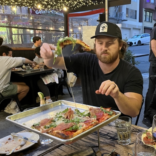 motion graphics designer brian hall eating pizza