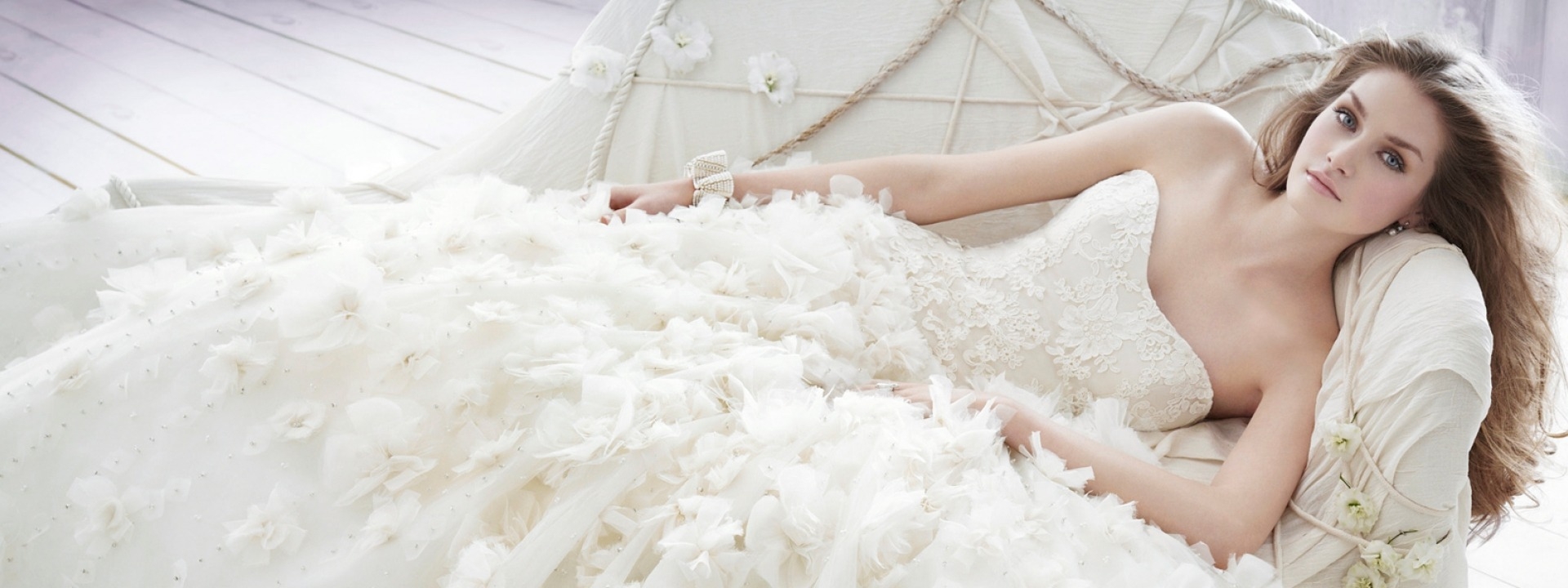 woman reclining in wedding dress